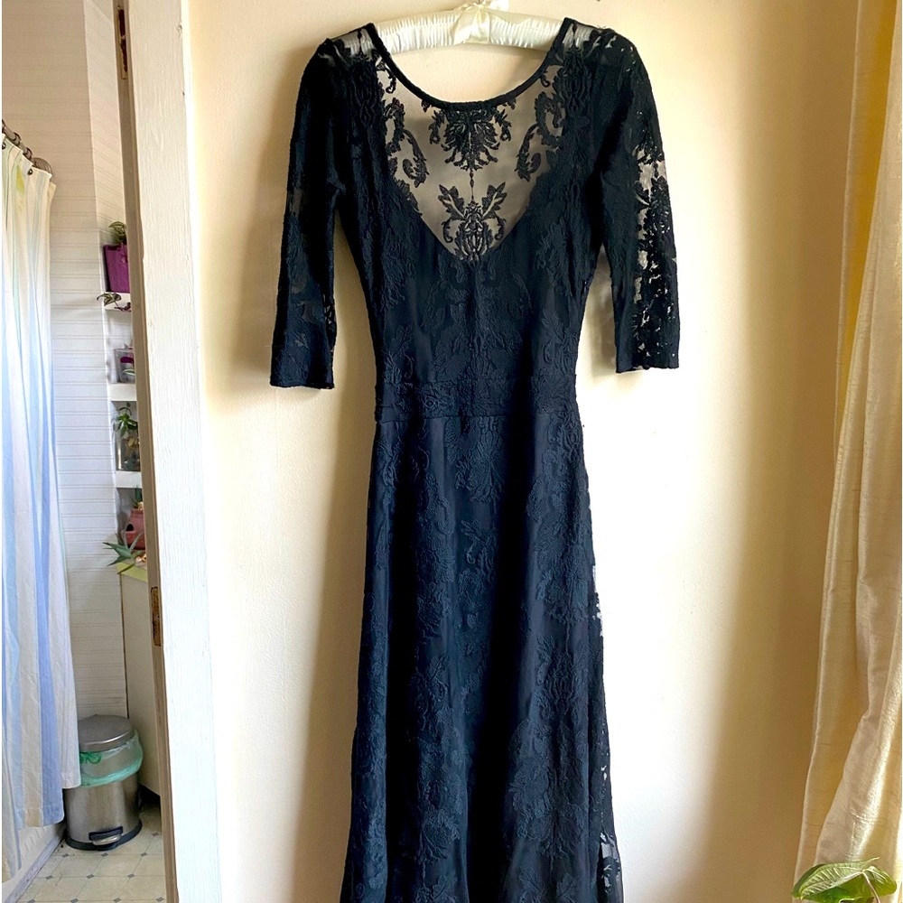 For Love and Lemons black backless lace dress. Never worn, purchased used.